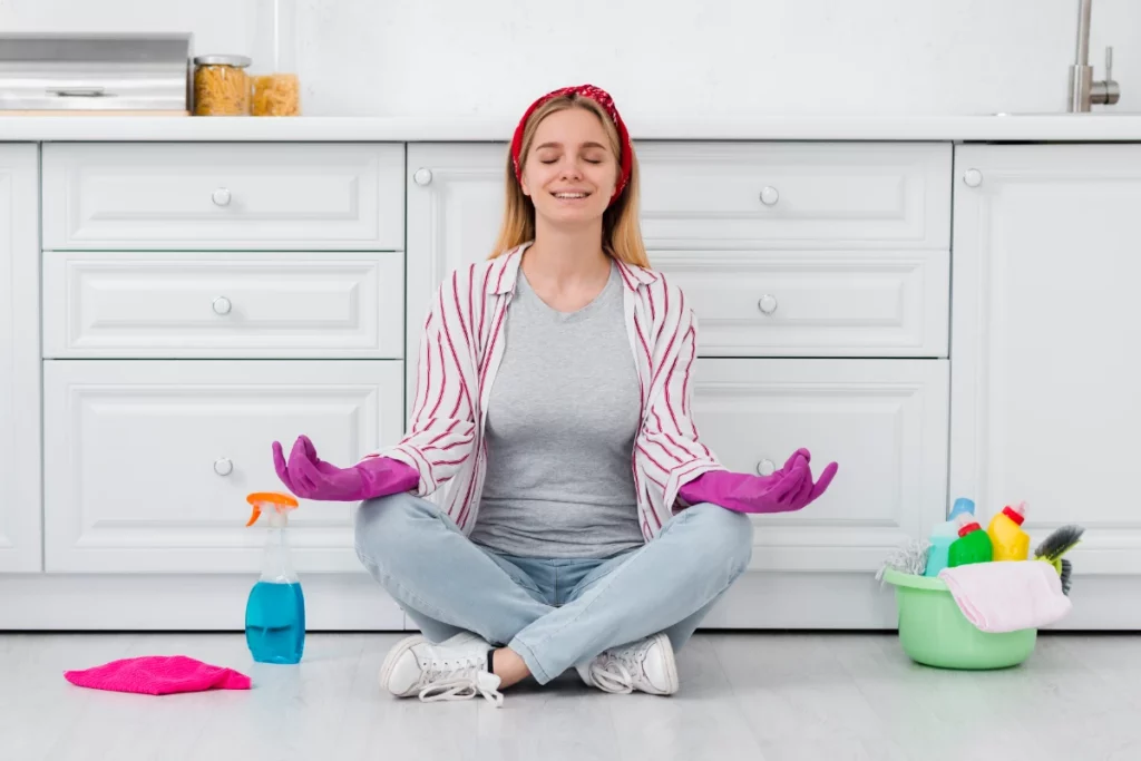 cleaning woman on break from cleaning